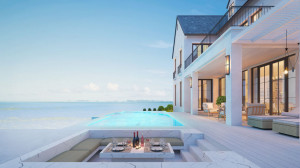 Luxury beach house with sea view swimming pool and terrace at vacation.3d rendering